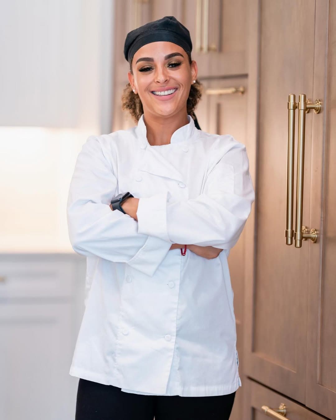 Chef Jess, founder of FreshEatz, in her chef coat